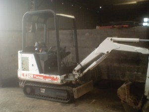 Bobcat digger used by Token Engineering for groundworks projects.